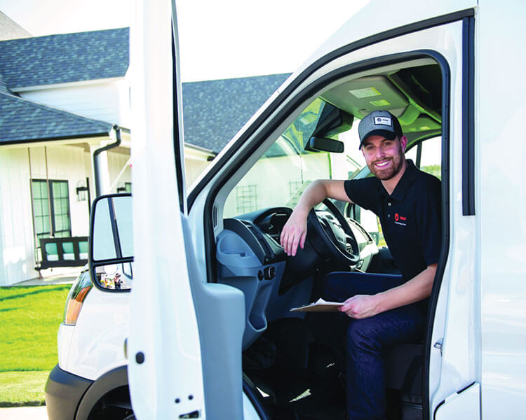 Trane technician in the truck